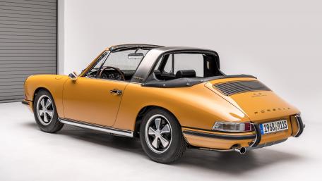 Classic Porsche Convertible in Striking Orange Shade wallpaper