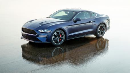 Sleek Blue Sports Car Reflected in Water Surface wallpaper