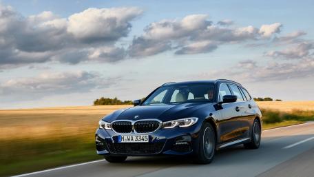 Sleek BMW in Scenic Landscape wallpaper