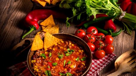 Delicious Chili with Fresh Ingredients and Tortilla Chips wallpaper