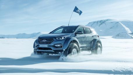 Powerful Hyundai SUV in a Winter Wonderland wallpaper
