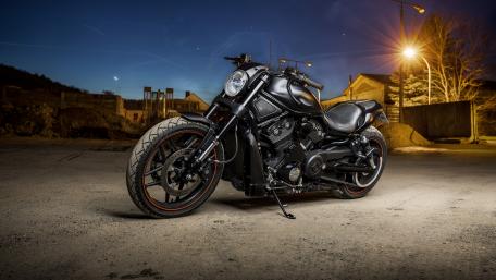 Sleek Motorcycle Under Night Sky wallpaper