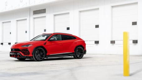 Dynamic Red Luxury SUV Wallpaper for Enthusiasts wallpaper