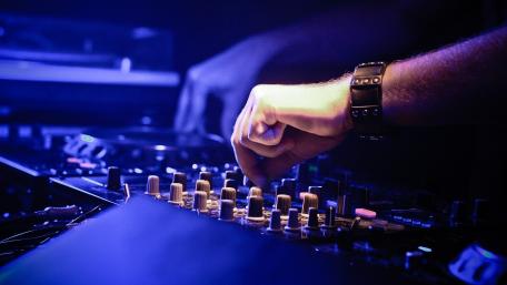 DJ's Passionate Craft Behind the Decks wallpaper