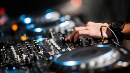 DJ in Action Spinning the Beats wallpaper