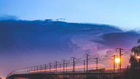 Urban Sunset Over Train Tracks wallpaper