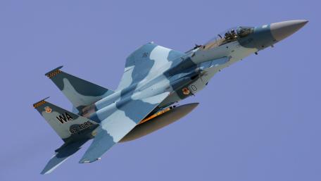 Fighter Jet in Action Above Clear Skies wallpaper