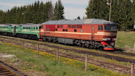Vintage Train on Scenic Tracks in 4K Quality wallpaper