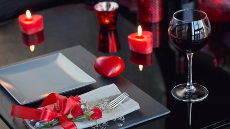 Romantic Dinner Setting for Two In Intimate Ambiance wallpaper