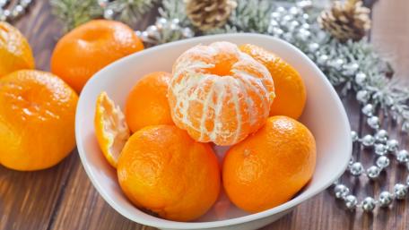 Vibrant Citrus Delight in a Bowl wallpaper