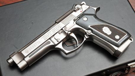 Sleek Beretta Handgun Wallpaper wallpaper