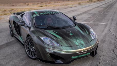 Sleek McLaren on an Open Road wallpaper