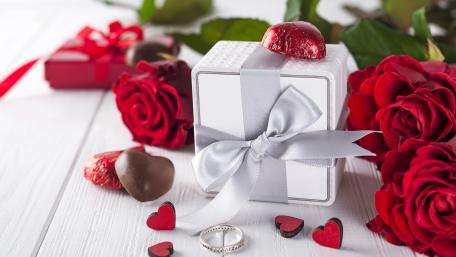 Elegant Gift of Love with Roses and Ring wallpaper