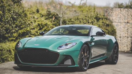 Sleek Green Aston Martin Design Wallpaper wallpaper