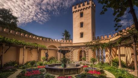 Tranquil Courtyard Oasis in a Historic Castle wallpaper