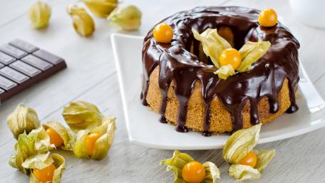 Delicious Chocolate Glazed Cake with Golden Berries wallpaper