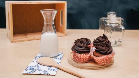 Delicious Cupcakes and Milk Treats for Sweet Moments wallpaper