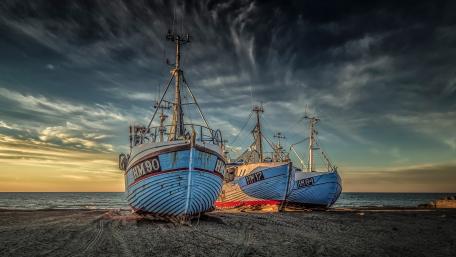 Serenity of Beachside Fishing Boats wallpaper