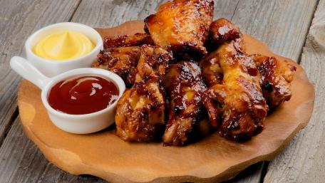 Delicious BBQ Chicken Wings Platter 4K Wallpaper wallpaper
