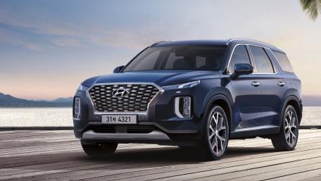 Sleek Hyundai SUV on Scenic Waterfront wallpaper