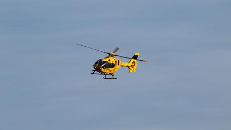 Helicopter in Flight Over a Clear Sky wallpaper
