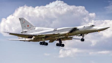 Sleek Bomber Aircraft in Flight Formation wallpaper
