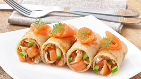 Delicious Savory Pancake Rolls with Salmon and Vegetables wallpaper