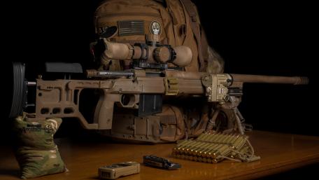 Precision Firepower in a Tactical Setup wallpaper