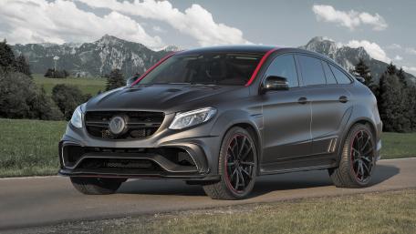 Sleek Luxury SUV in Stunning Landscape wallpaper