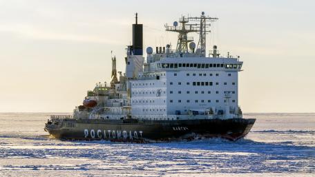 Majestic Icebreaker Navigating Frozen Waters wallpaper
