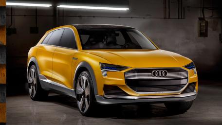 Sleek Audi SUV in a Stunning Yellow Finish wallpaper