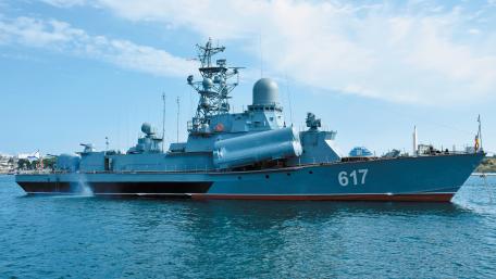 Warship at Sea in Bright Sunlight wallpaper