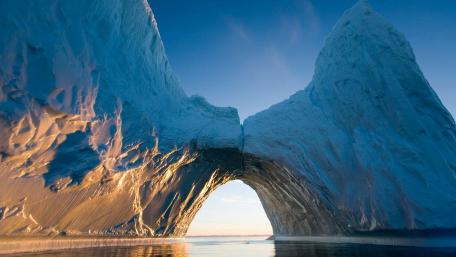 Majestic Ice Arch in Arctic Waters wallpaper