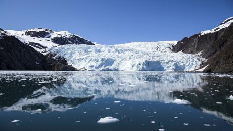 Majestic Glacier Reflections on Calm Waters wallpaper