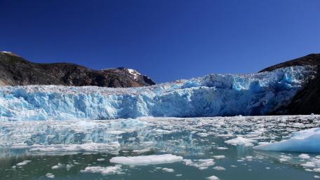 Majestic Glacier Under Clear Blue Sky wallpaper