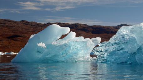 Majestic Icebergs in Serene Waters wallpaper
