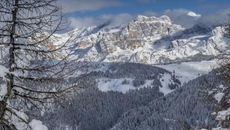 Majestic Snow-Capped Mountains Beneath a Blue Sky wallpaper