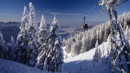Snowy Mountain Vista with Cable Car Adventure wallpaper
