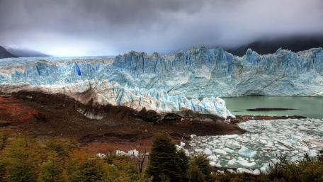 Majestic Glacier Surrounded by Nature's Beauty wallpaper