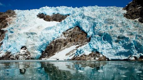 Majestic Glacier Reflections in Clear Waters wallpaper