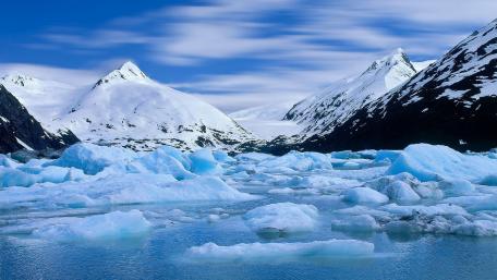 Majestic Frozen Landscape in Serene Blue Sky wallpaper