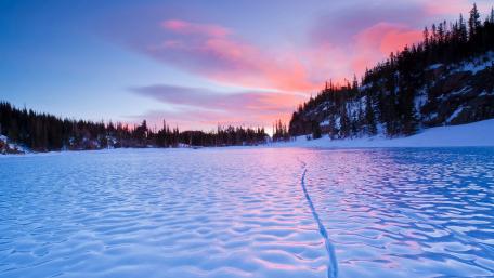 Serene Winter Landscape with Colorful Sky wallpaper