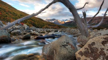 Tranquil River in a Majestic Landscape wallpaper