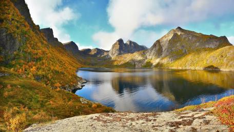 Serene Mountain Landscape Reflected in Calm Waters wallpaper