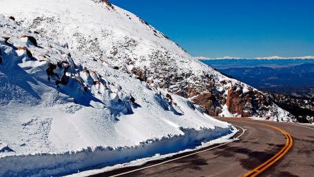 Snowy Mountain Road Adventure wallpaper