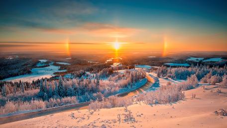 Stunning Winter Sunrise Over Scenic Landscape wallpaper