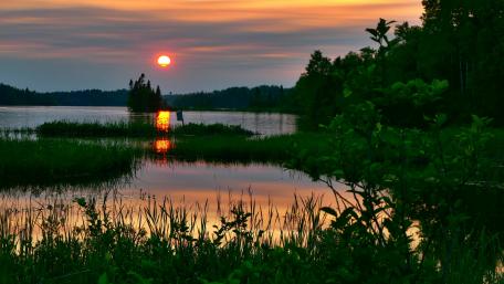 Serene Sunset Over Tranquil Lake Landscape wallpaper