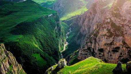 Majestic Green Valleys in Sunlight wallpaper