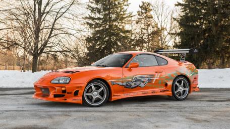 Bright Orange Dream: High-Performance Machine in 4K Detail wallpaper