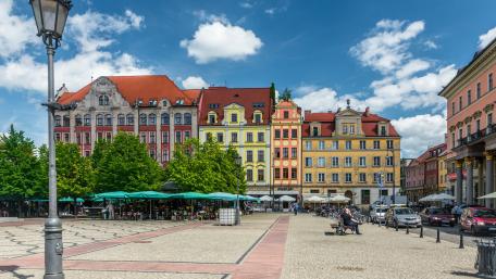 Charming City Square in Vibrant Colors wallpaper